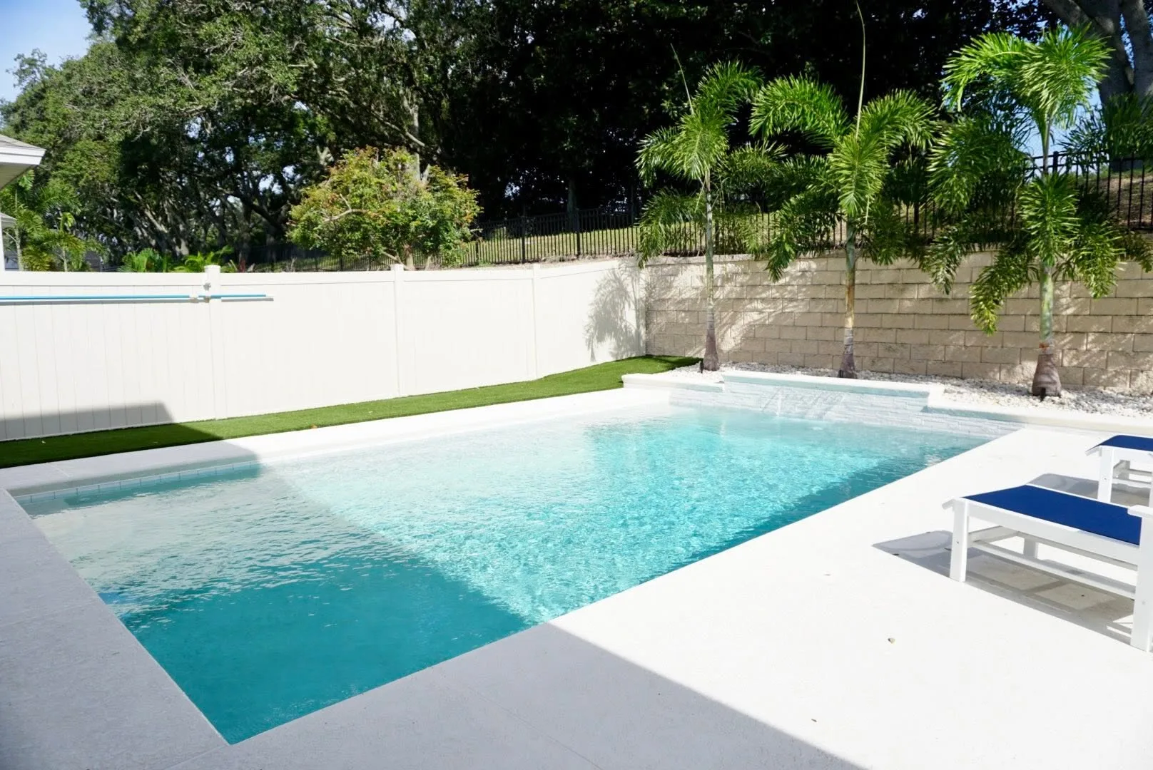 Custom backyard swimming pool at an Orlando home, illustrating residential pool placement during the planning and design process